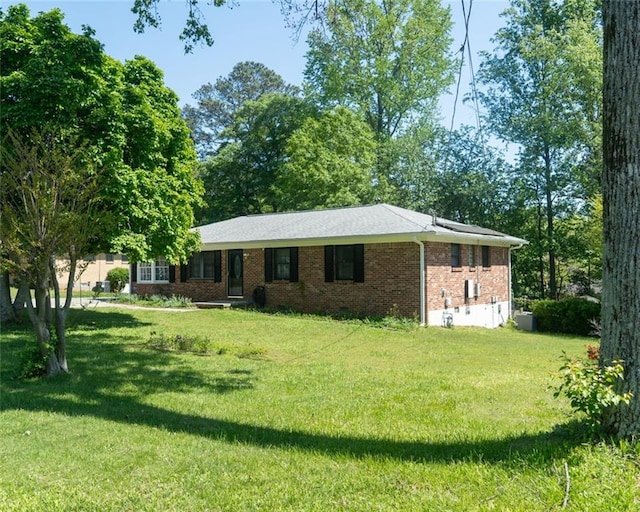 724 Camelot Way, Norcross, GA 30071 - ranch-style home featuring a front lawn and brick siding