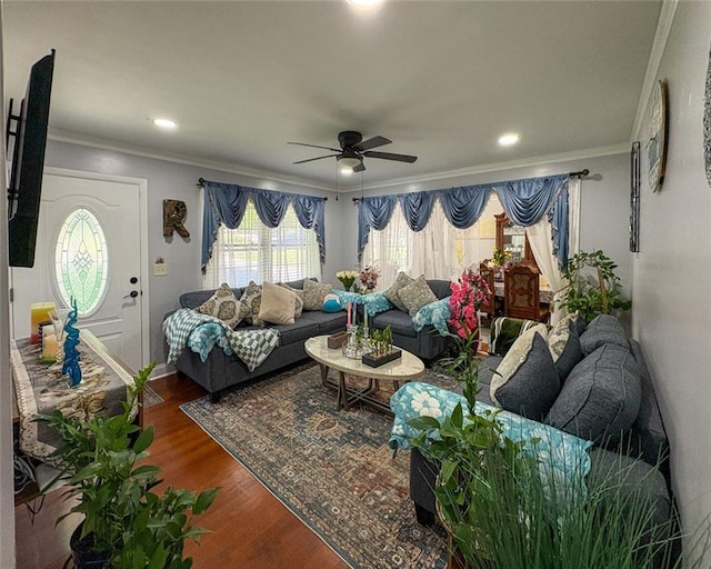 living room featuring dark wood finished floors, ornamental molding, a ceiling fan, and recessed lighting