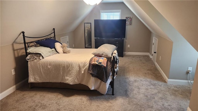 bedroom featuring vaulted ceiling, carpet floors, and baseboards