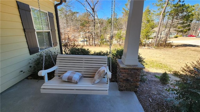 view of patio featuring a porch