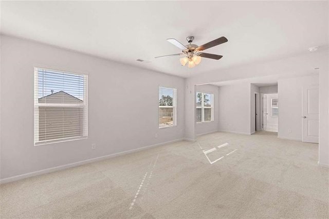 unfurnished bedroom featuring ceiling fan and light colored carpet