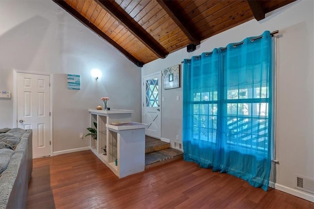 interior space with high vaulted ceiling, wooden ceiling, hardwood / wood-style floors, and beam ceiling