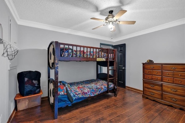 bedroom featuring ceiling fan, ornamental molding, a textured ceiling, and dark hardwood / wood-style flooring