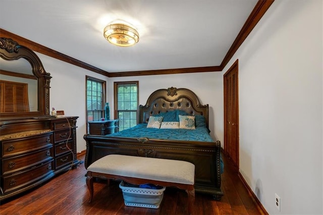 bedroom featuring crown molding and dark wood-type flooring