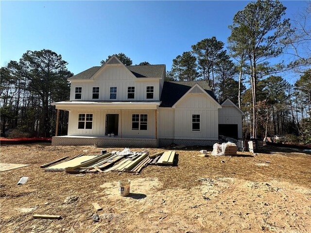 property under construction with covered porch