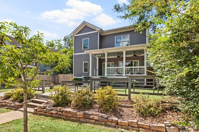 view of front of property featuring ceiling fan and covered porch