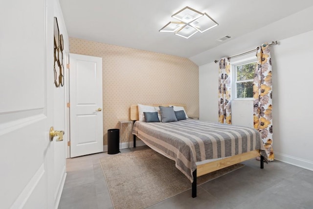 bedroom with vaulted ceiling