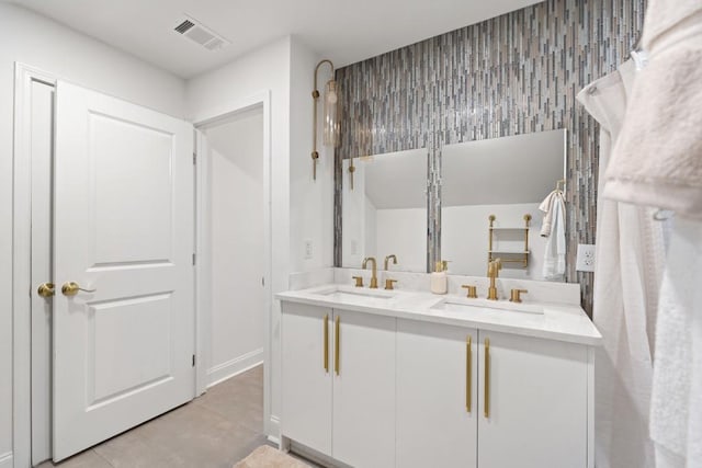 bathroom featuring tile patterned floors and vanity