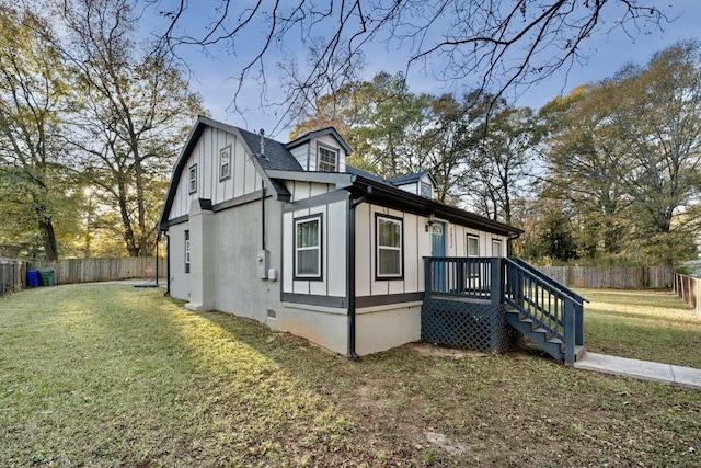 view of home's exterior featuring a yard