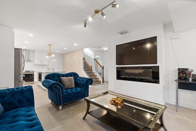 living room with rail lighting