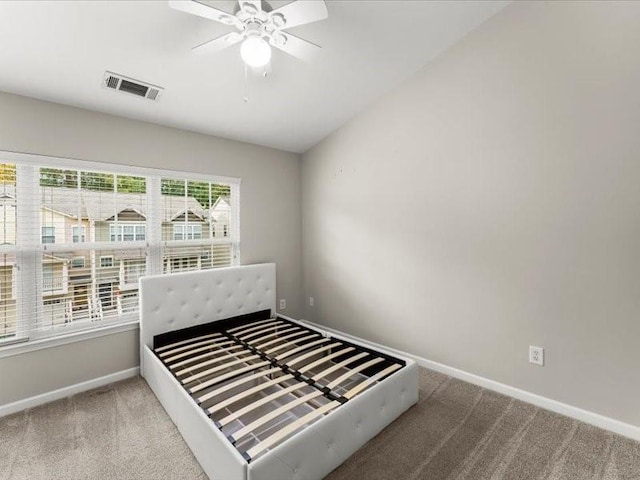 bedroom featuring ceiling fan and carpet flooring