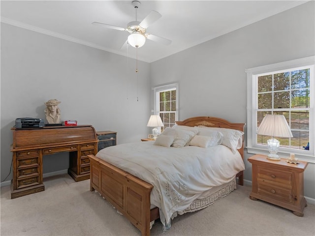 bedroom featuring light carpet, baseboards, and crown molding