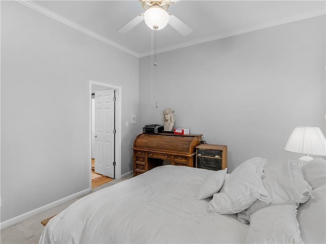 bedroom featuring ceiling fan, baseboards, and crown molding