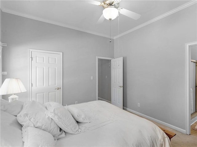 bedroom with a ceiling fan, baseboards, and crown molding