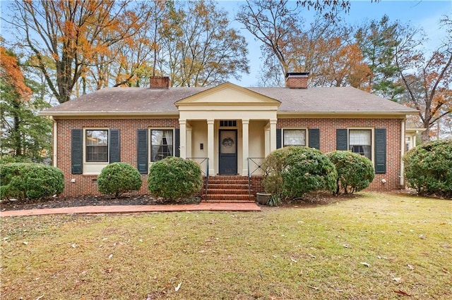 view of front of property with a front lawn