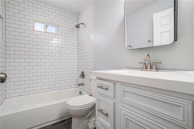 full bathroom with shower / bath combination, vanity, and toilet