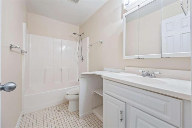 full bathroom featuring tile patterned flooring, vanity, tub / shower combination, and toilet