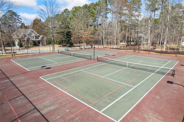 view of sport court featuring basketball hoop