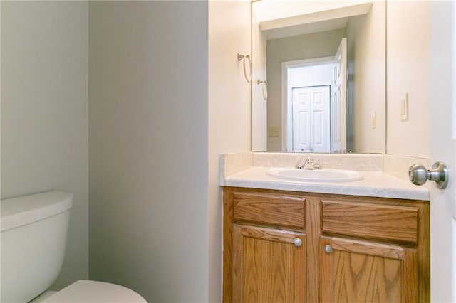 2191 Phillips Rd, Lithonia, GA 30058 - bathroom with toilet and vanity