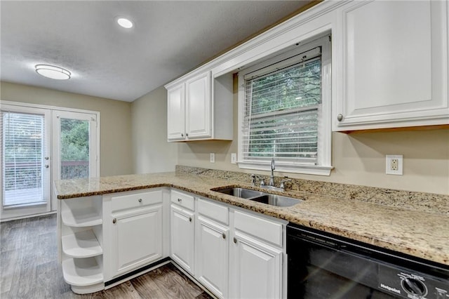 1400 Scenic Brook Trl SW, Conyers, GA 30094 - kitchen with dishwasher, a sink, open shelves, white cabinets, and a peninsula