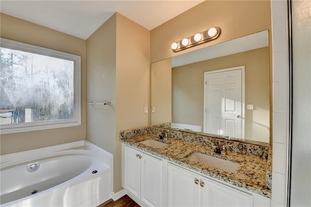 1400 Scenic Brook Trl SW, Conyers, GA 30094 - bathroom with a garden tub and double vanity