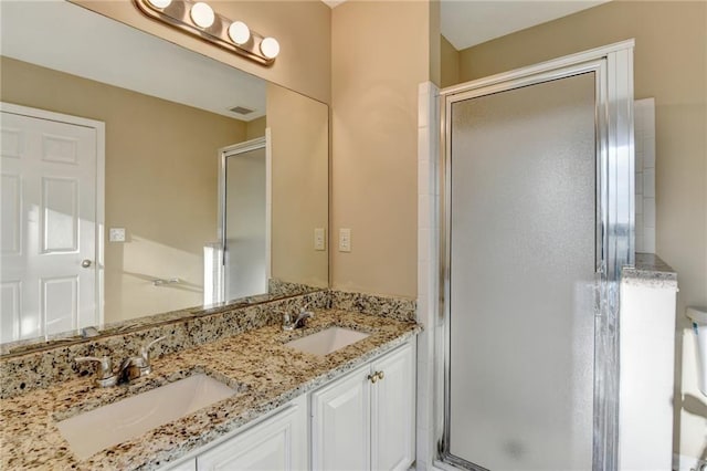 1400 Scenic Brook Trl SW, Conyers, GA 30094 - bathroom featuring a stall shower and double vanity