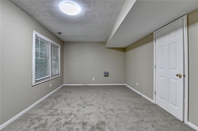 1400 Scenic Brook Trl SW, Conyers, GA 30094 - basement with carpet flooring, a textured ceiling, and baseboards