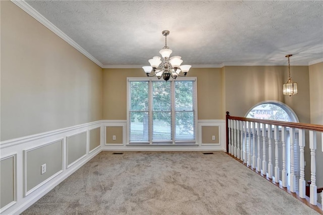 1400 Scenic Brook Trl SW, Conyers, GA 30094 - carpeted empty room with a chandelier, plenty of natural light, a decorative wall, crown molding, and a wainscoted wall