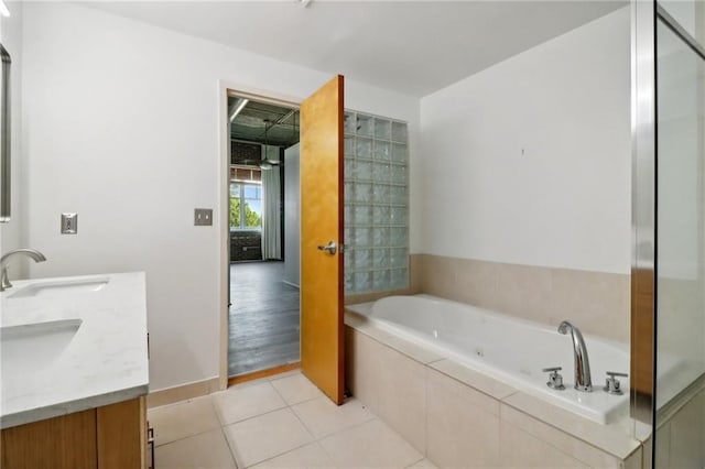 bathroom featuring vanity, tile patterned floors, and plus walk in shower