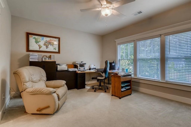 home office with light colored carpet and ceiling fan