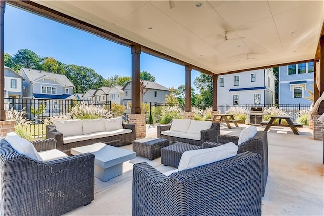 view of terrace featuring ceiling fan and an outdoor hangout area