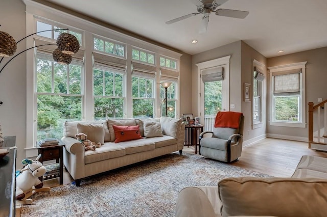 sunroom / solarium with ceiling fan