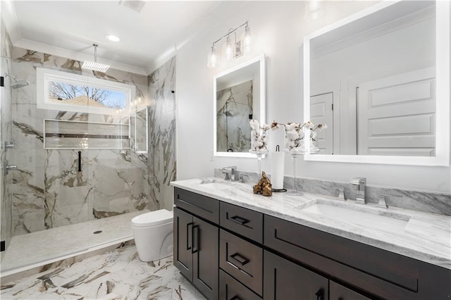 bathroom featuring toilet, a shower with door, and vanity