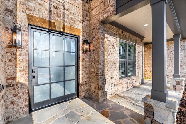 doorway to property featuring a porch