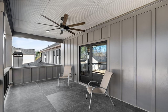 sunroom with plenty of natural light and ceiling fan