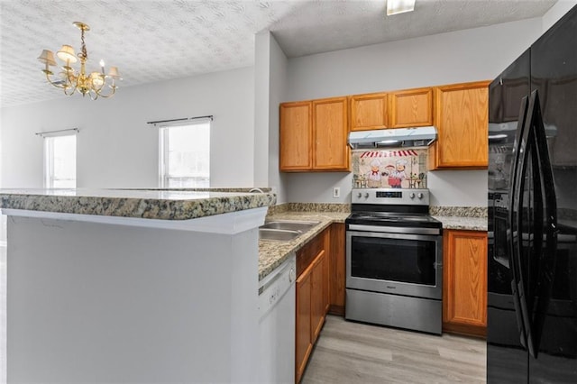 kitchen with dishwasher, light wood-type flooring, black refrigerator with ice dispenser, kitchen peninsula, and stainless steel electric range oven