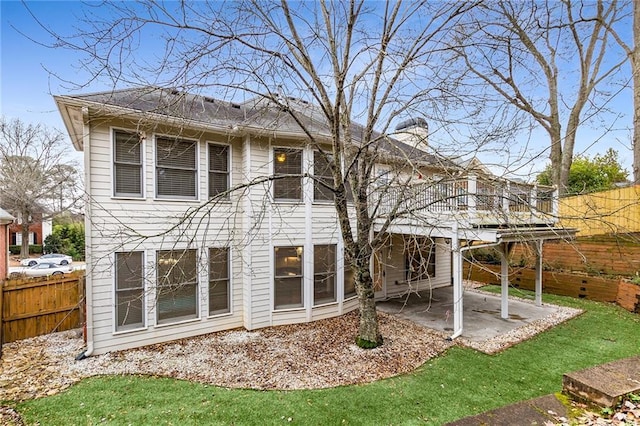 rear view of property with a patio area