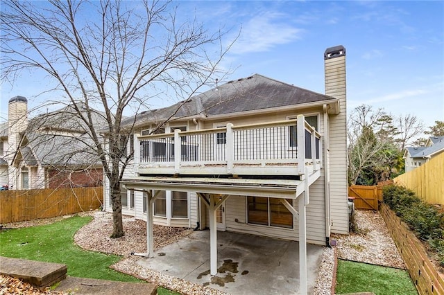 rear view of property with a patio area