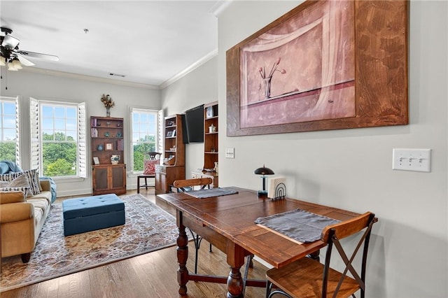 360 Chambers St Unit 402, Woodstock, GA 30188 - dining space with wood finished floors, ornamental molding, and a ceiling fan