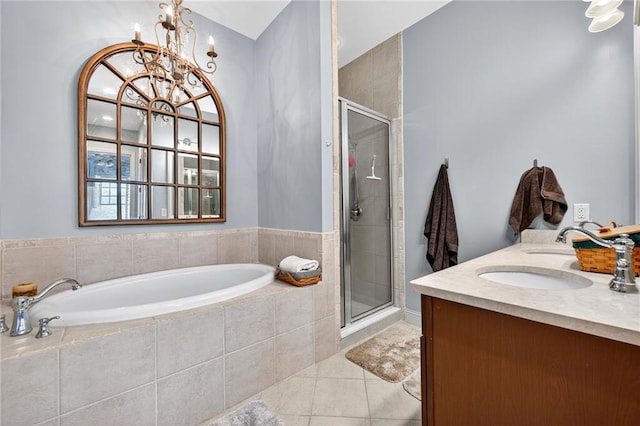 360 Chambers St Unit 402, Woodstock, GA 30188 - full bath featuring tile patterned flooring, a garden tub, a shower stall, a chandelier, and double vanity