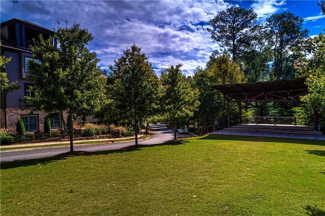 360 Chambers St Unit 402, Woodstock, GA 30188 - view of community featuring a yard