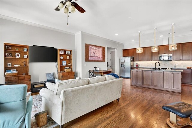 360 Chambers St Unit 402, Woodstock, GA 30188 - living room featuring a ceiling fan, crown molding, dark wood-type flooring, and recessed lighting