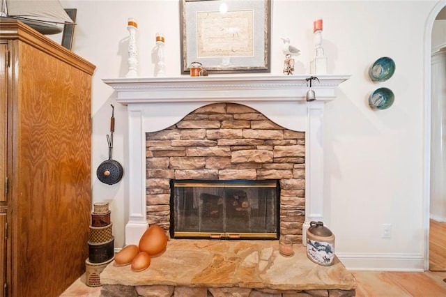 details featuring a stone fireplace