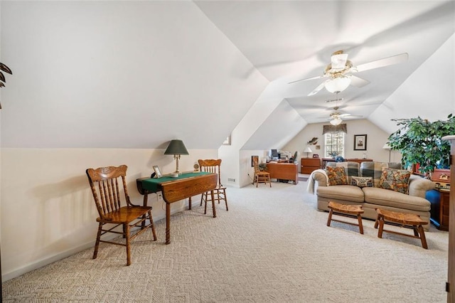 interior space featuring vaulted ceiling, ceiling fan, and light colored carpet