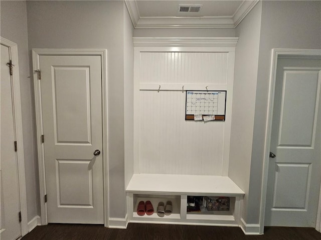 mudroom with crown molding and dark hardwood / wood-style floors