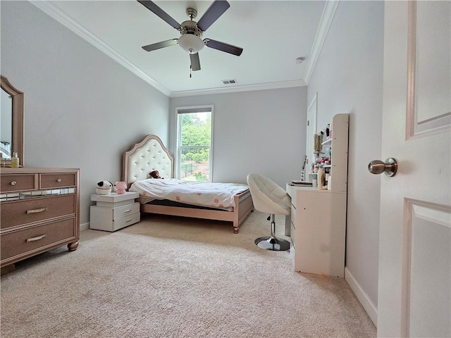 bedroom featuring light carpet, crown molding, and ceiling fan