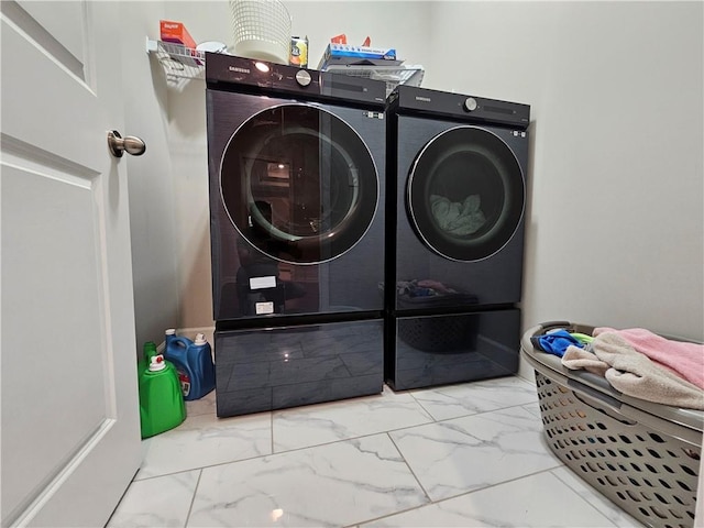 laundry room with separate washer and dryer