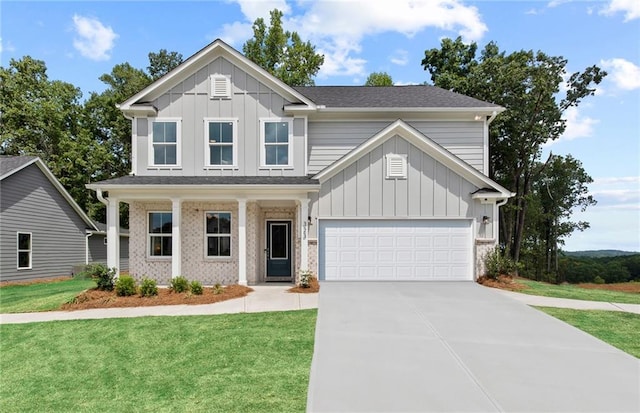 808 Tupelo Way, Villa Rica, GA 30180 - view of front facade with concrete driveway, board and batten siding, a front lawn, a shingled roof, and a garage
