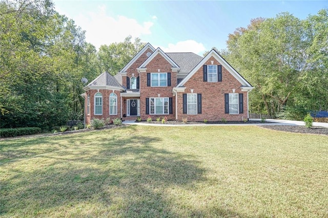 view of front of home featuring a front lawn