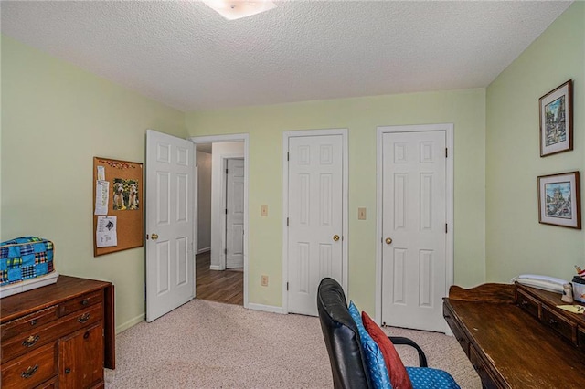 3264 Salem Cove Trl SE, Conyers, GA 30013 - carpeted home office featuring a textured ceiling and baseboards